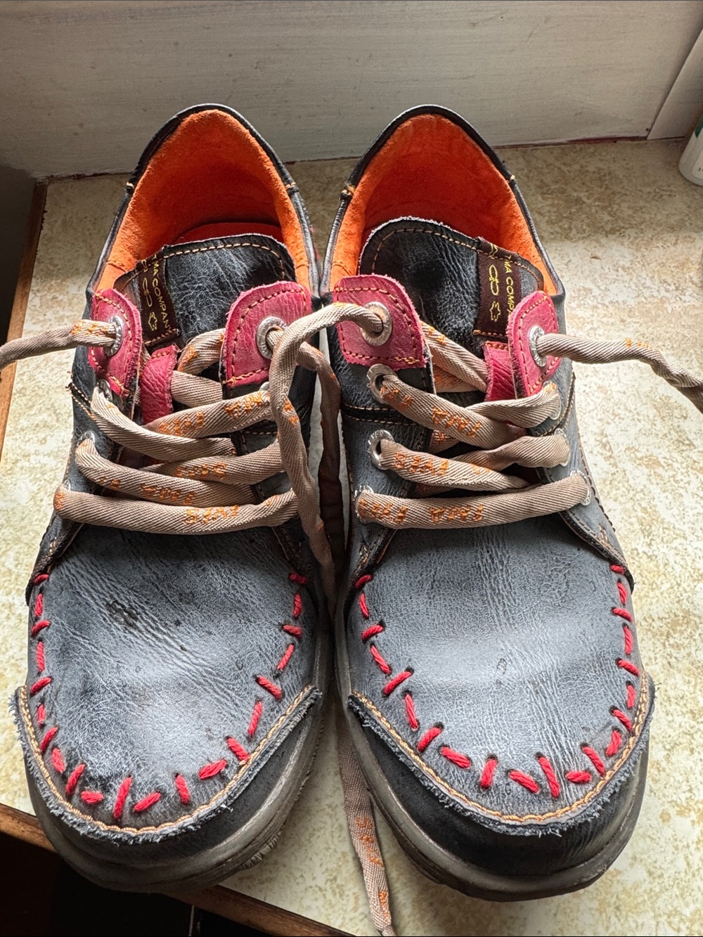 Men's Black Leather Slip-On Loafers with Red Stitching and Orange Lining